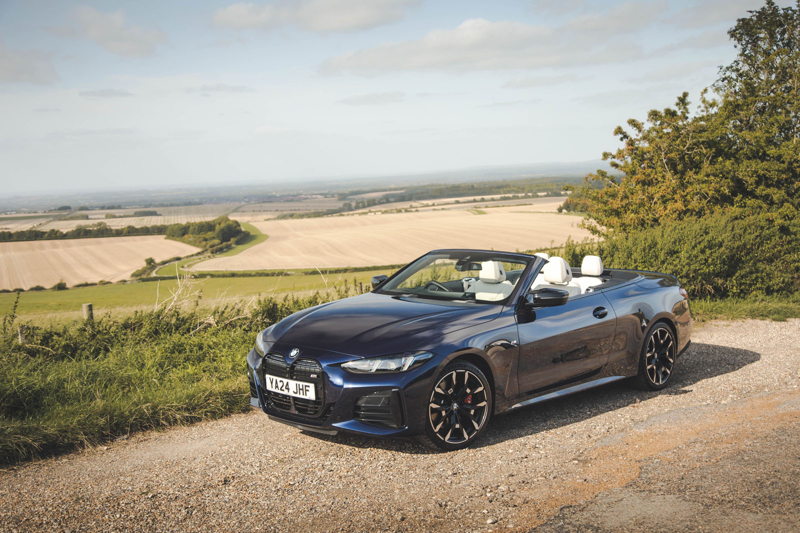 BMW M440i Cabriolet in blue   static front three quarters