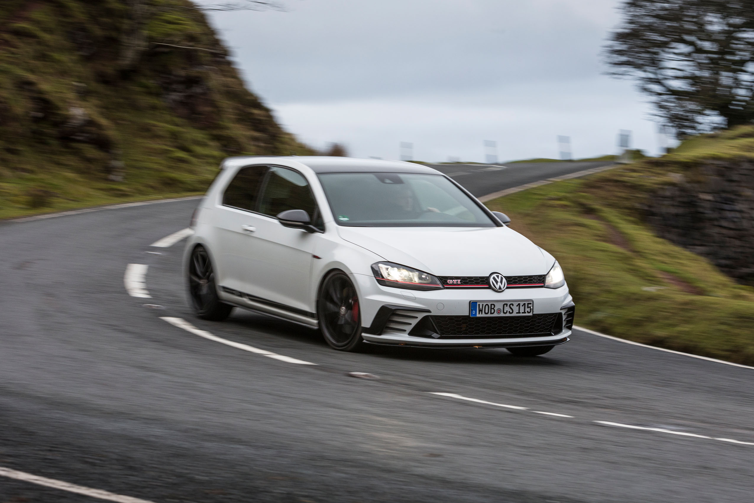 Mclaren 570gt Vs Volkswagen Golf Gti Vs Mercedes Benz E Class Estate Road Test Of The Year Autocar