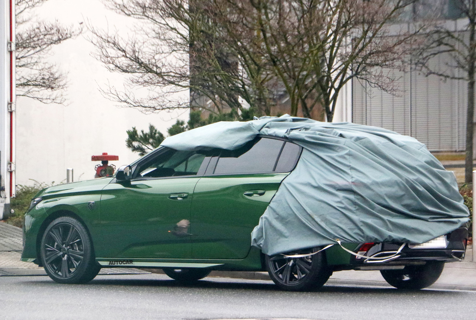 Peugeot 308 estate rendered after first spy photos