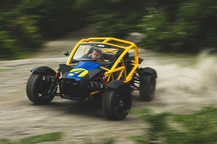 Ariel Nomad front quarter sliding on dirt track