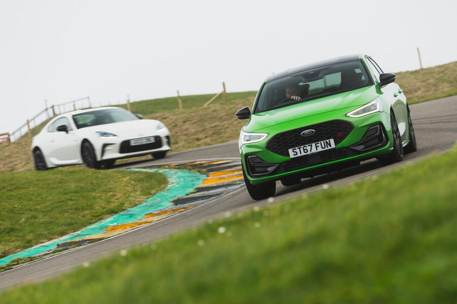 Toyota GR86 and Ford Focus ST driving on Anglesey circuit