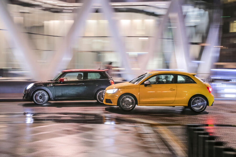 Mini Cooper S JCW and Audi S1 driving through London at night â€“ side tracking