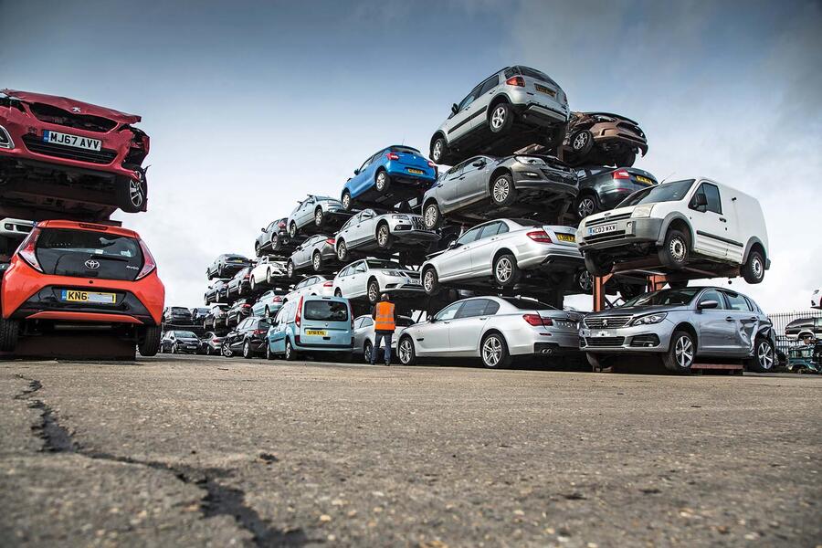 Scrapped cars in breaker's yard