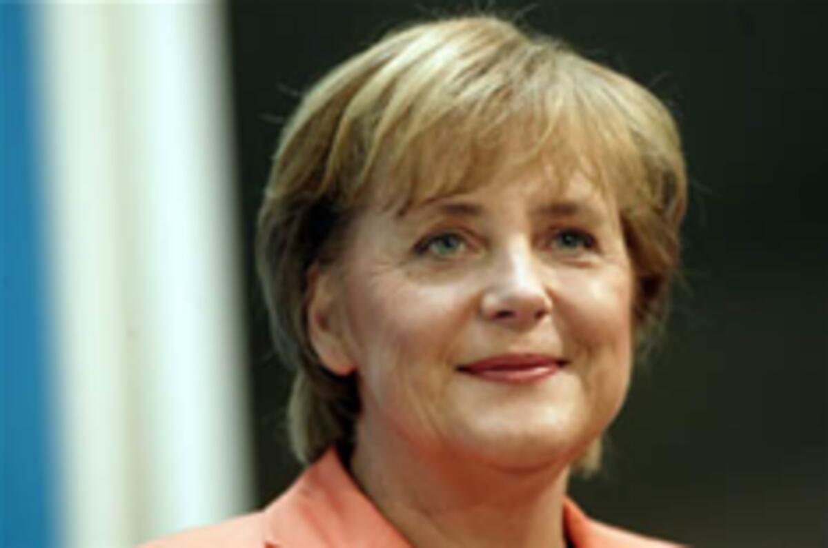 Merkel hits back for German car-makers