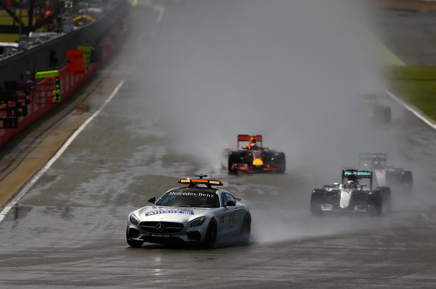 Image result for Images of F1 cars behind safety car in rain