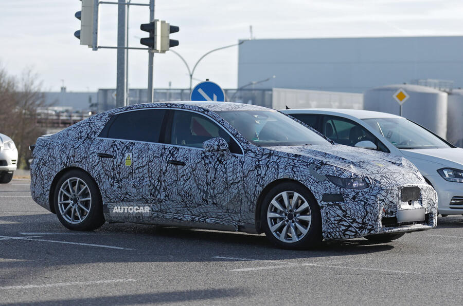 Mercedes C Class EV camo front quarter